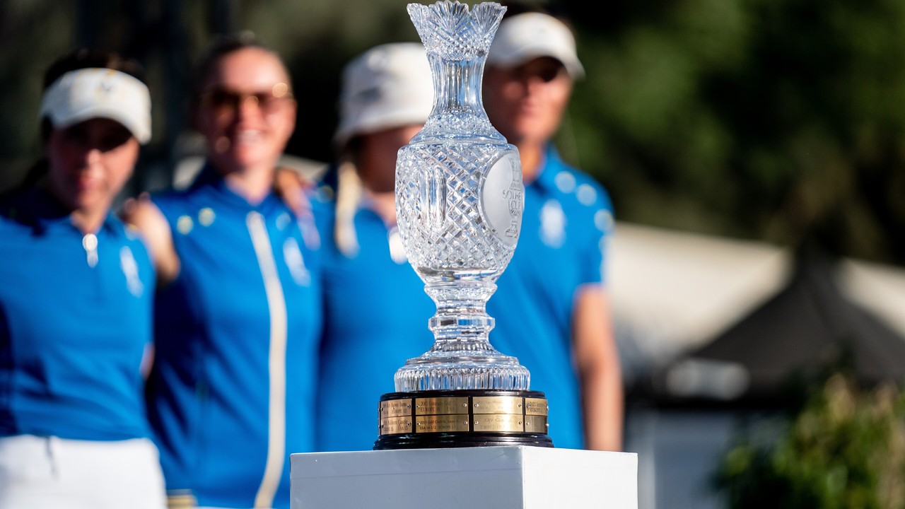 The Solheim Cup trophy with Team Europe players