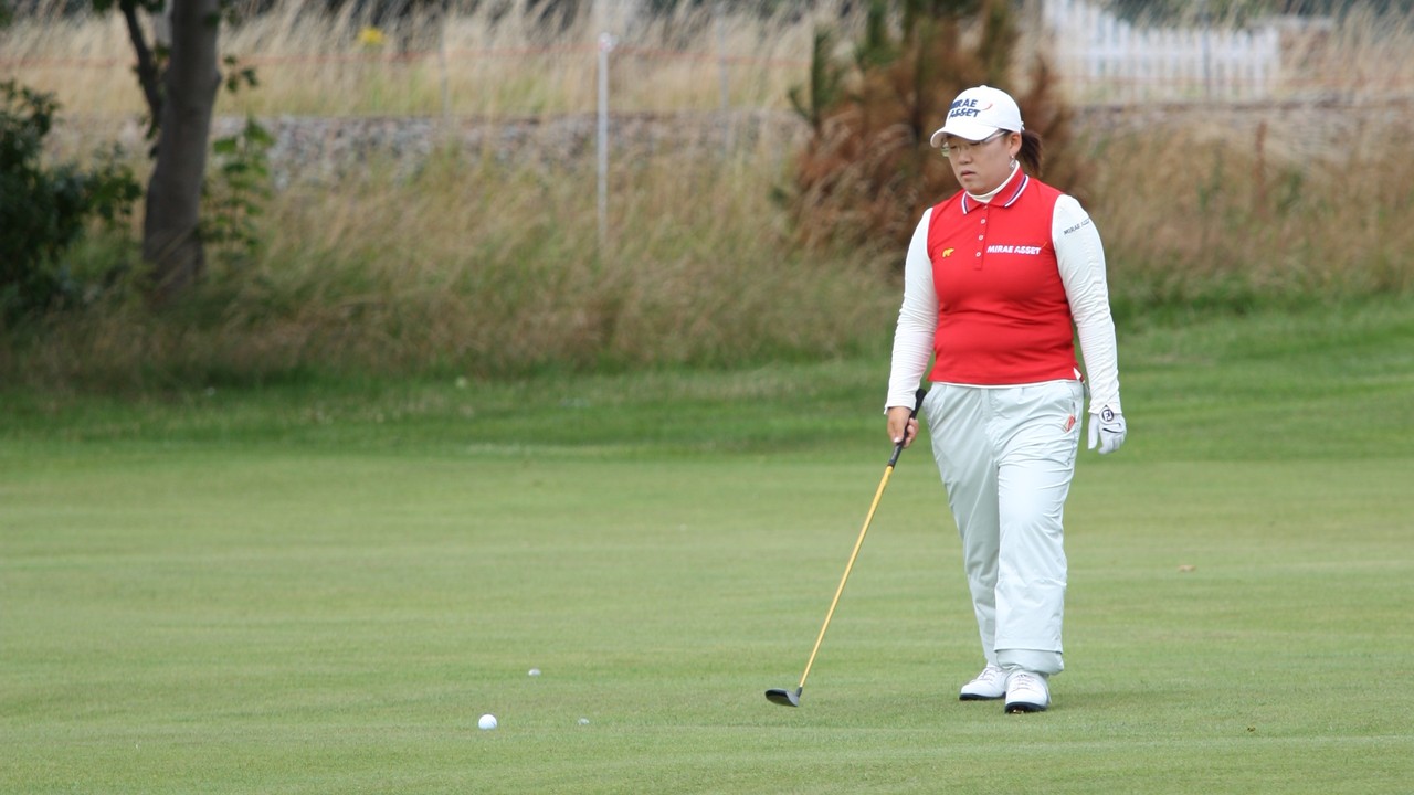 Jiyai Shin walking the green at a tournament